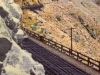 Train Skirting Mountain
